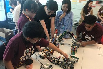 Young students from a robotics team showcase robots at a technology event at the UN. (12 June 2019)