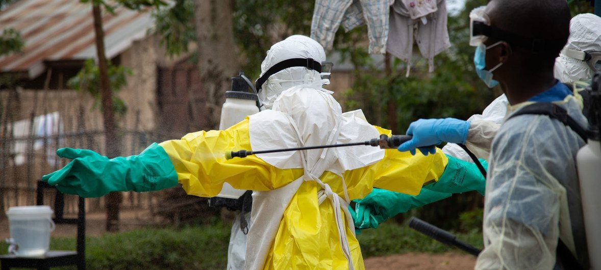 Rinsing Ebola protective gear in Beni, Democratic Republic of the Congo (31 May 2019).