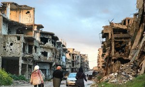 Life is slowly returning to this street in the Juret Al-Shayah district of Homs, Syria. Residents trickling back to the neighbourhoods they fled to escape fighting find desolate and lifeless streets, only half-cleared of rubble and without electricity or 