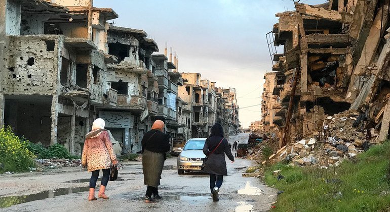 Life is slowly returning to this street in the Juret Al-Shayah district of Homs, Syria. Residents trickling back to the neighbourhoods they fled to escape fighting find desolate and lifeless streets, only half-cleared of rubble and without electricity or 