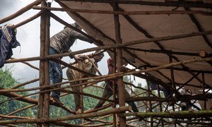 A communal shelter under construction in the largest collective displacement site in Gedeb, Ethiopia.