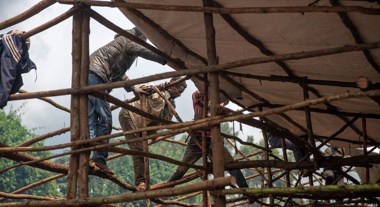 A communal shelter under construction in the largest collective displacement site in Gedeb, Ethiopia.