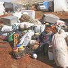 Families take shelter in a makeshift camp, 50 kilometers north of Idlib, in Syria. Since the beginning of September 2018, thousands of people have been displaced, following an escalation of hostilities in the country’s north-west.