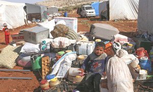 Families take shelter in a makeshift camp, 50 kilometers north of Idlib, in Syria. Since the beginning of September 2018, thousands of people have been displaced, following an escalation of hostilities in the country’s north-west.