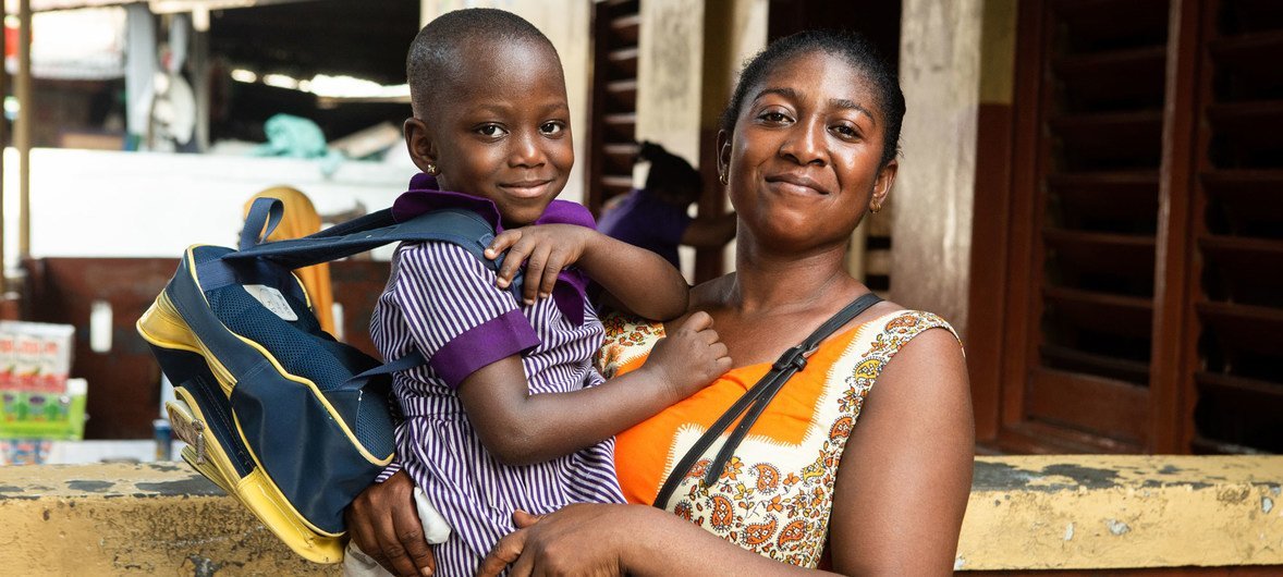 Women in Makola market in Accra, Ghana, benefit from childcare services. (December 2018)
