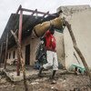 A government soldier leaves a school in Kodok, South Sudan, which had been used to accommodate the South Sudan People Defense Forces. (May 2019)