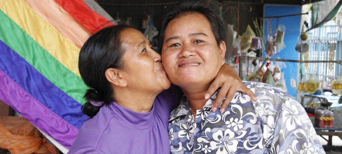 Changing families give rise to needed policy changes. Sao Mimol kisses her partner in Cambodia during an LGBT Pride event. (file)