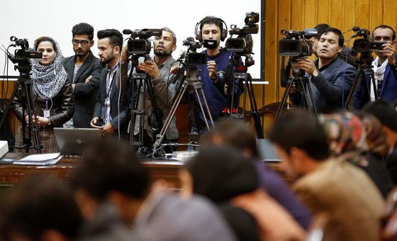 Journalists covering UNAMA's keynote address on International Day to Stop Impunity for Crimes against Journalists, in Kabul, Afghanistan (November 2018).