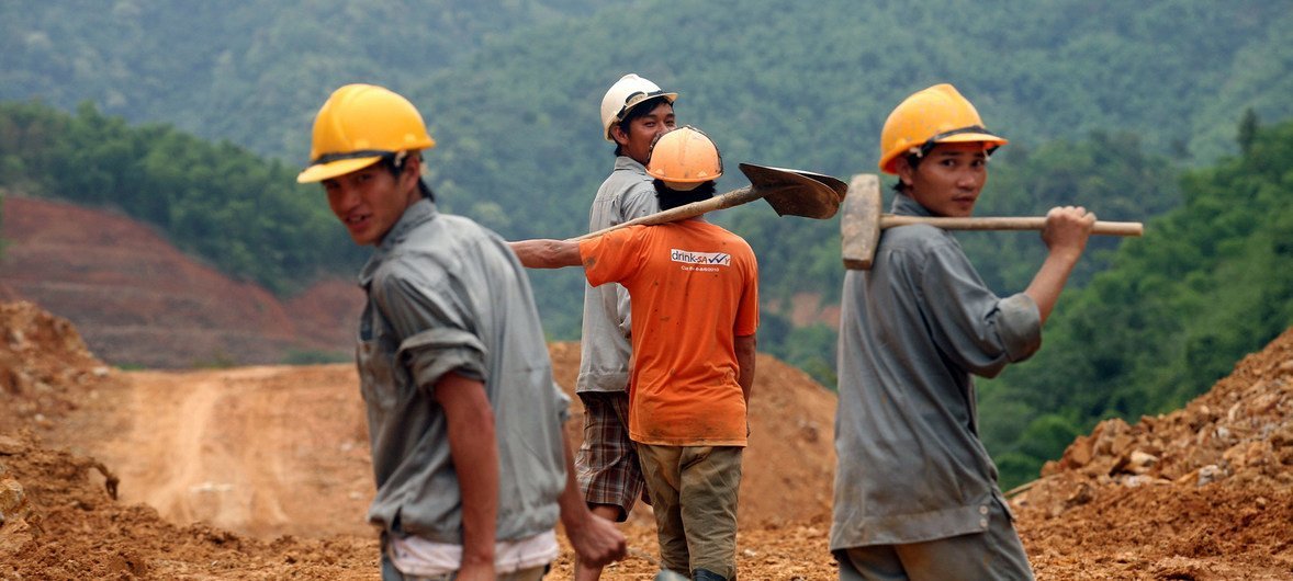 Construction workers at the Trung Son Hydropower project construction site, Vietnam.