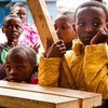 Des enfants à l'ouverture d'un centre à Mlango Kubwa, dans le bidonville de Mathare dans la capitale kenyane, Nairobi