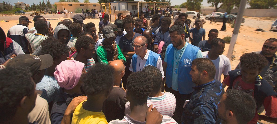 UNHCR Chief of Mission for Libya, Jean-Paul Cavalieri, with officials, refugees and migrants after arriving at Tajoura detention centre. (3 July 2019)