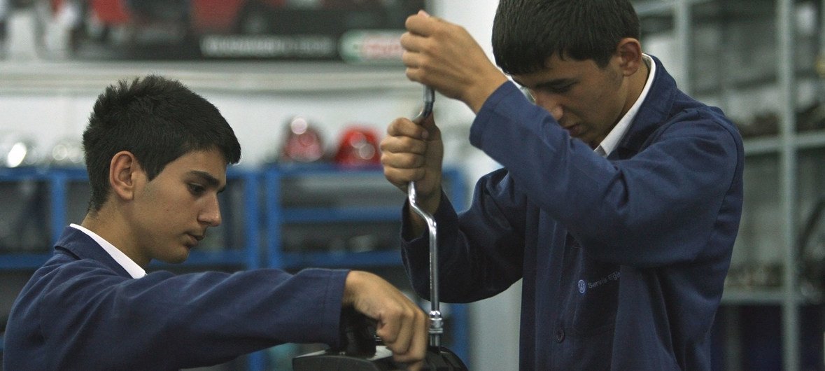Students work on an engine at Sisli Vocational High School in Istanbul, Turkey.
