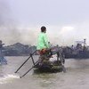 A woman boat-driver in Mekong Delta, Vietnam. (23 July 2014)