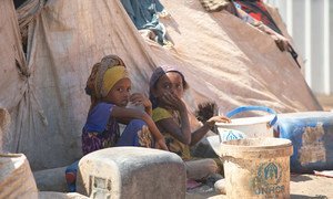 Children sitting next to their tent at the Al-Meshqafah camp in Yemen. (26 February 2019)