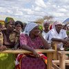 Women farmers in a community hard hit by drought gather in Kenya. To deliver on the Sustainable Development Goals, new ways of collective action are needed.