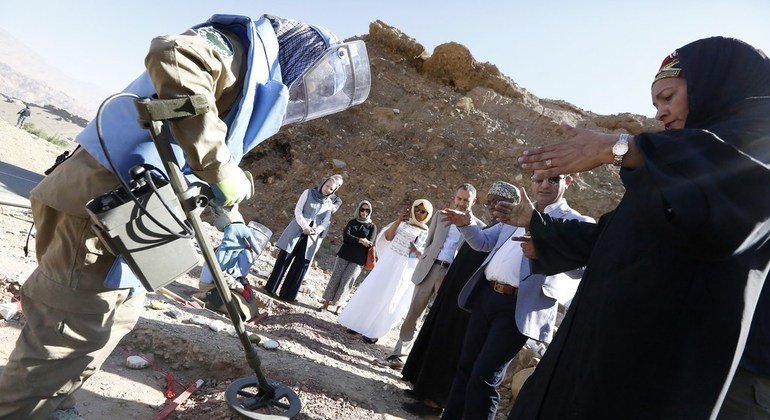 UN Deputy Secretary General Amina J. Mohammed (right) speaks to deminers during a visit to demining site in Bamyan, Afghanistan. (21 July 2019)